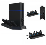 Black gaming console with charging station and multiple controllers on a white background